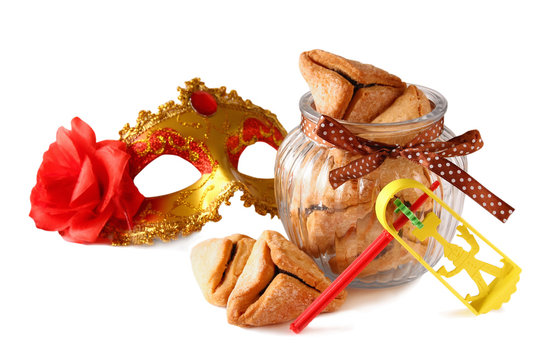 Purim celebration concept (jewish carnival holiday). selective focus. isolated on white 