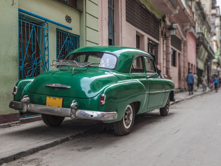 Cuban classic car parked in a street of old Havana