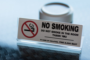 Non smoking sign on a table