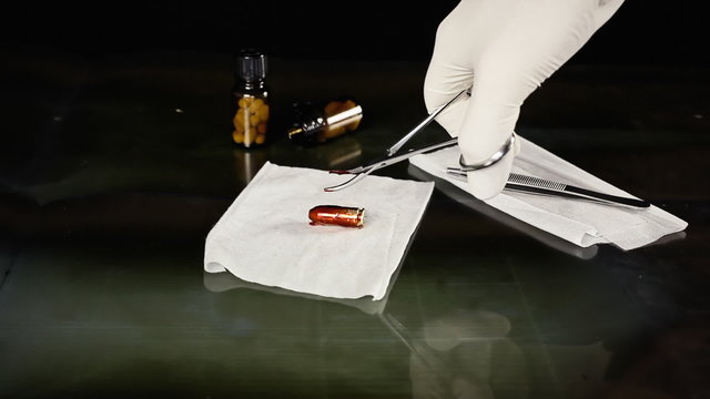 Bullet extracted forceps blood pills