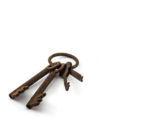 Old rusty key on white background.