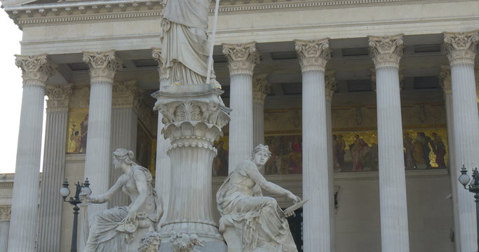 VIENNA, AUSTRIA. The Austrian Parliament and statue of Athena Pallada. Parliament building covers near 13500 square meters.