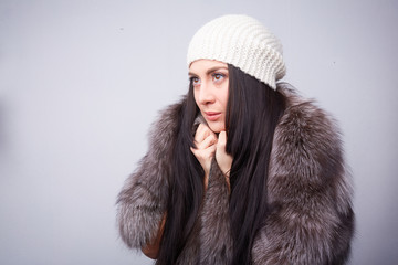 woman in a fur coat