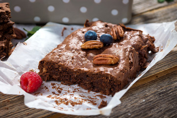 Brownies on wooden background