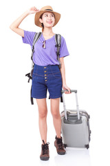 Full length of young woman in casual walking with the travel bag on white background