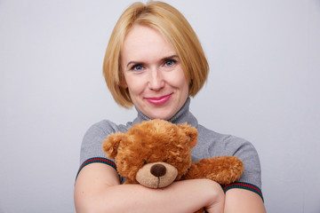Woman with teddy bear