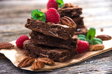 Brownies on wooden background