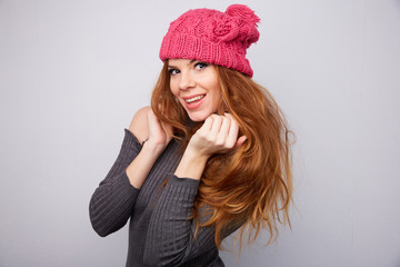 woman in a pink hat