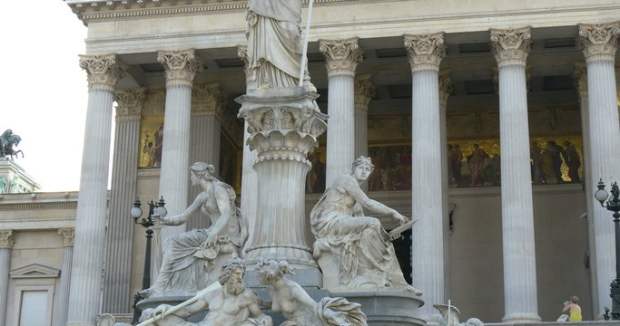 VIENNA, AUSTRIA. The Austrian Parliament and statue of Athena Pallada. Parliament building covers near 13500 square meters.