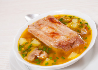 Meat soup with vegetables and mushroom