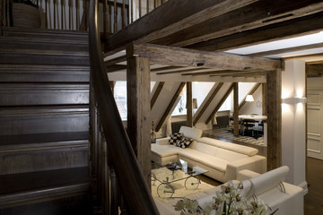 Modern wooden interior interior in private house.  Wooden stairs