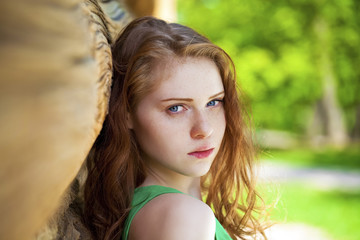 Beautiful young red hair woman