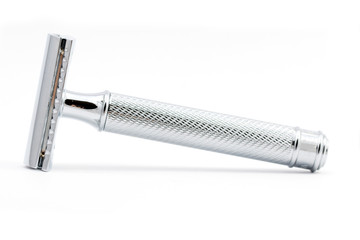 Safety razor on white