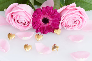 Pink roses and gerbera flower with golden hearts - series of pink flowers