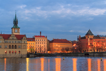 Obraz premium Scenic view in night of the Old Town architecture over Vltava river in Prague, Czech Republic
