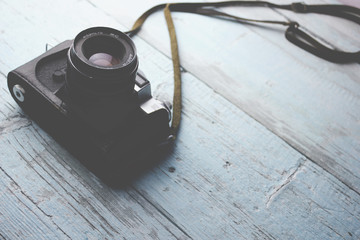 camera on wooden table