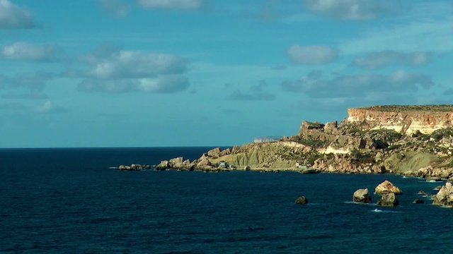 Malta, Golden Bay area, view onto cliffs and blue sea on a sunny day