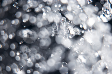 In0focus and out of focus water drops levitating 