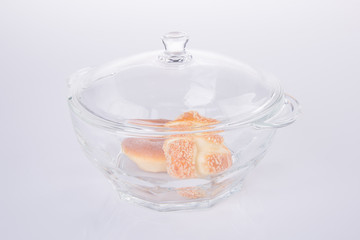 Obraz na płótnie Canvas glass bowl with food on a background