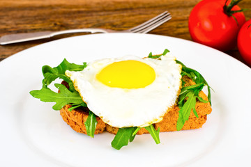 Scrambled Eggs with Arugula on Whole Grain Bread