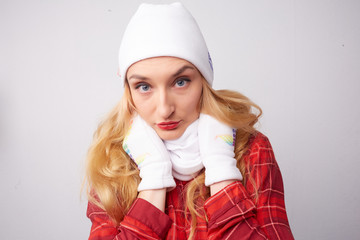 portrait of a girl in a white hat and scarf