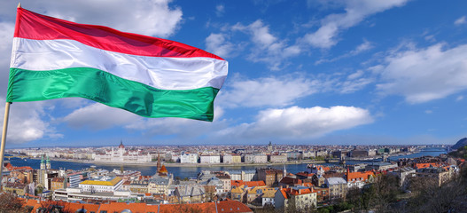 Panorama of Budapest with flag in Hungary