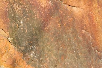 Detail of stone texture with crack background.