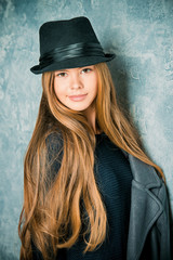 smiling girl in hat