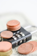 Secure your savings concept with cipher lock and money 