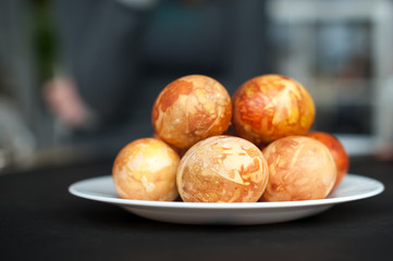 Bio and Natural way of painted eggs with fresh leaves and onion shells