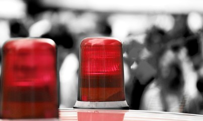 red lights of a police car in the big city