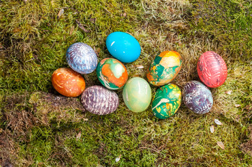 Colorful Easter eggs on the moss