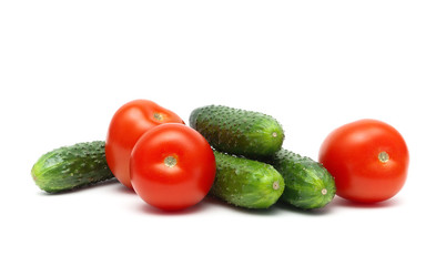 cucumbers and tomatoes isolated on white background