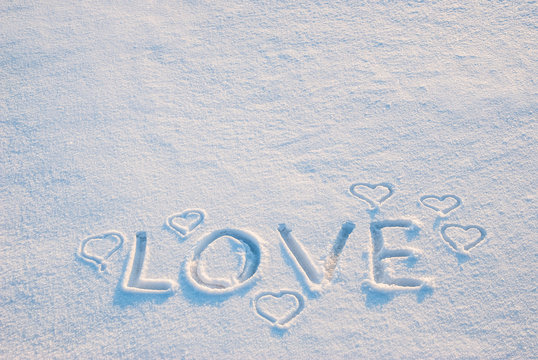 Word love on snow
