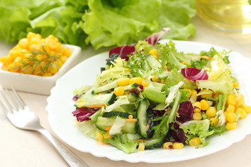 Salad made of fresh vegetables with oil