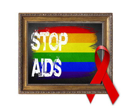 LGBT flag STOP AIDS World Aids Day concept with red ribbon and aids awareness
