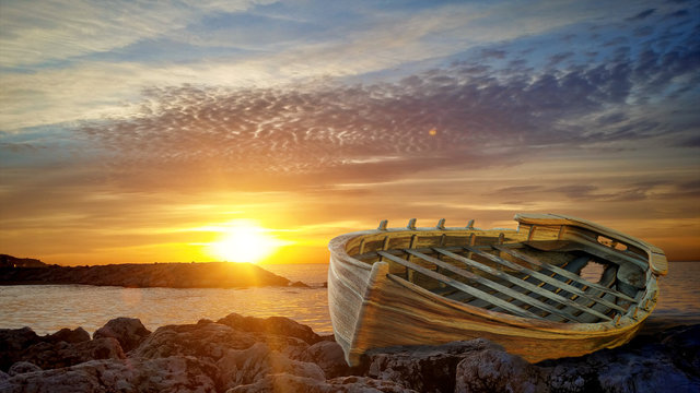 Drifting boat at sunset