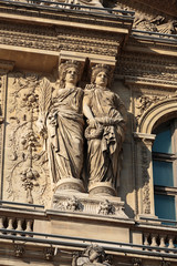 Paris -  Architectural fragments of Louvre building. Louvre Museum is one of the largest and most visited museums worldwide.