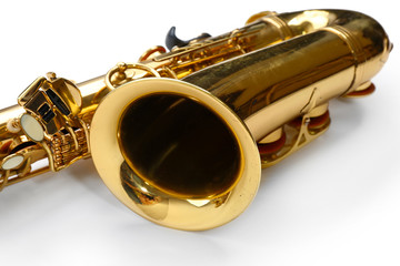 Obraz premium Golden saxophone isolated on white background, close up