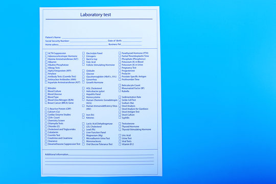 Laboratory test list on blue background, close up
