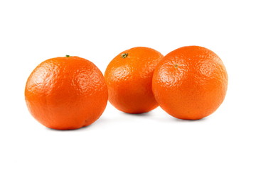 Three studio isolated mandarins on white background