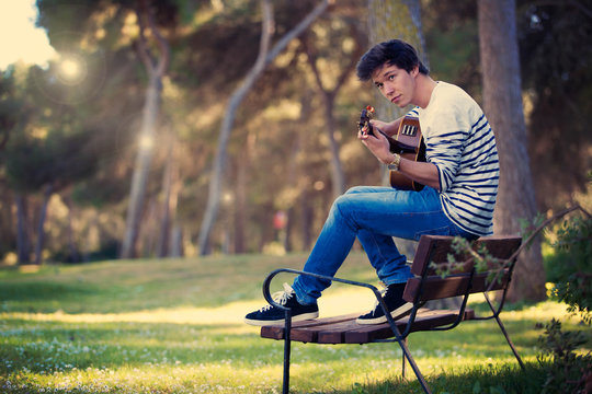 musician playing guitar