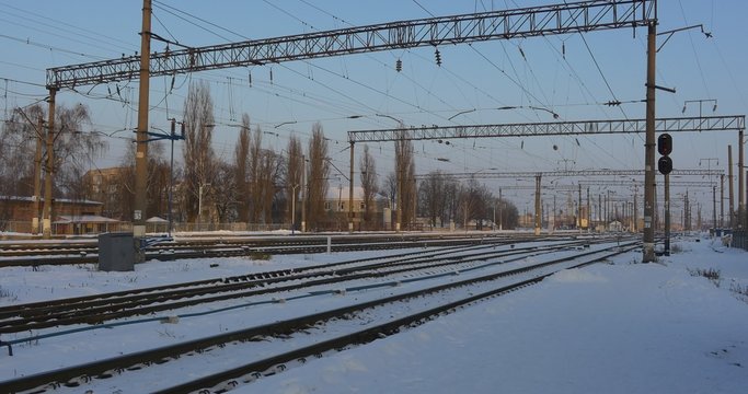 Panorama of Rails Empty Railway Station Konotop City in Winter Wire Towers Buildings of a Station Snow on a Ground Sunset Clear Sky Ukraine