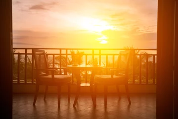 Crédence de cuisine en verre imprimé Mer / coucher de soleil Served table with romantic view to sea