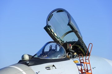 Fighter jet with open empty bulletproof cockpit of military multifunction plane, fourth-generation...