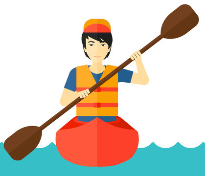 Man riding in canoe.