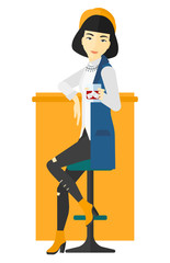 Fototapeta premium Woman sitting at bar.