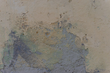Wall fragment with attritions and cracks