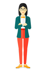 Woman standing with crossed arms.