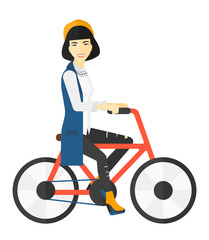 Woman riding bicycle.